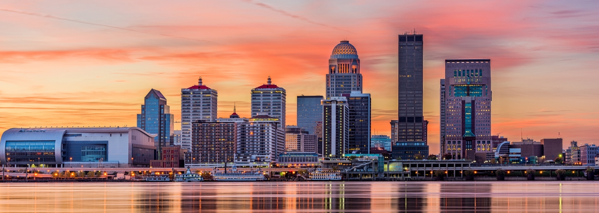 Louisville, Kentucky Skyline overlooking the Ohio River at sunrise